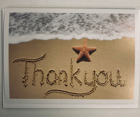 Thank you in sand